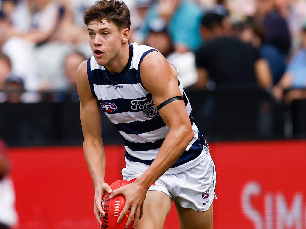 Connor O'Sullivan looks for an option against the Dockers. Picture: Michael Willson/AFL Photos via Getty Images