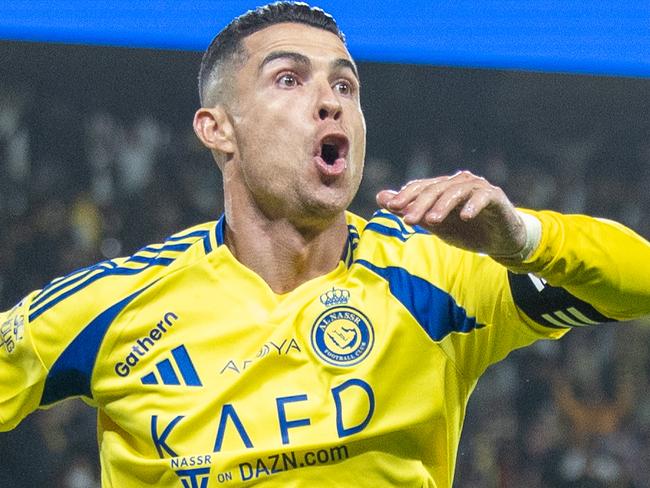 RIYADH, SAUDI ARABIA - FEBRUARY 7: Cristiano Ronaldo  of Al-Nassr FC celebrates scoring their third goal during the Saudi Pro League match between Al-Nassr and Al-Fayha at Al Awwal Park on February 7, 2025 in Riyadh, Saudi Arabia. (Photo by Abdullah Ahmed/Getty Images)