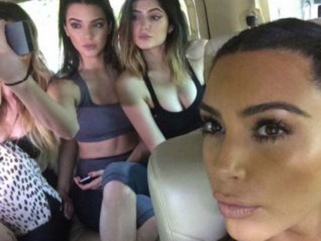 Kim’s younger sisters Kendall and Kylie make cameos. Credit: Kim Kardashian/Rizzoli