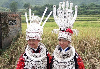 Poetic panoramas ... ornately crowned Miao girls. Picture: Brad Crouch