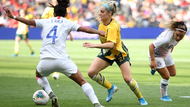 Australia’s Ellie Carpenter takes on Chile’s Francisca Lara. Picture: AAP