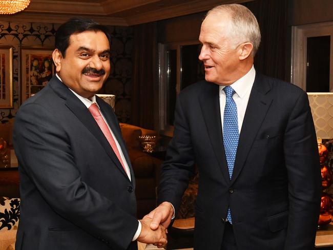 Australian Prime Minister Malcolm Turnbull (right) meets with India's Adani Group founder and chairman Gautam Adani in New Delhi, India on Monday, April 10. Picture: Mick Tsikas/AAP