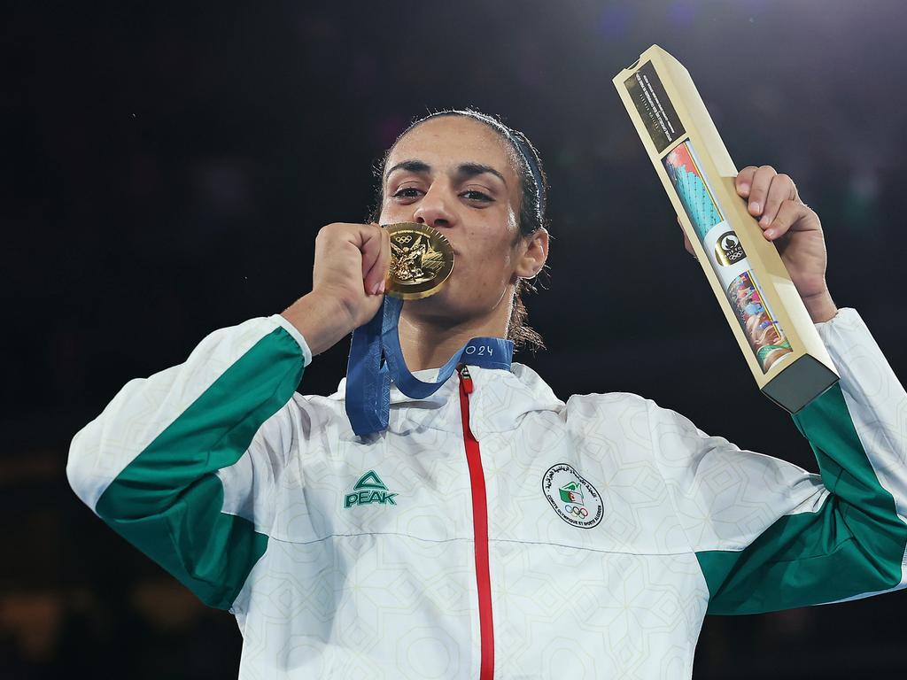 Imane Khelif kisses her gold medal after winning the women's 66kg final at the Paris Olympics. Picture: Getty Images