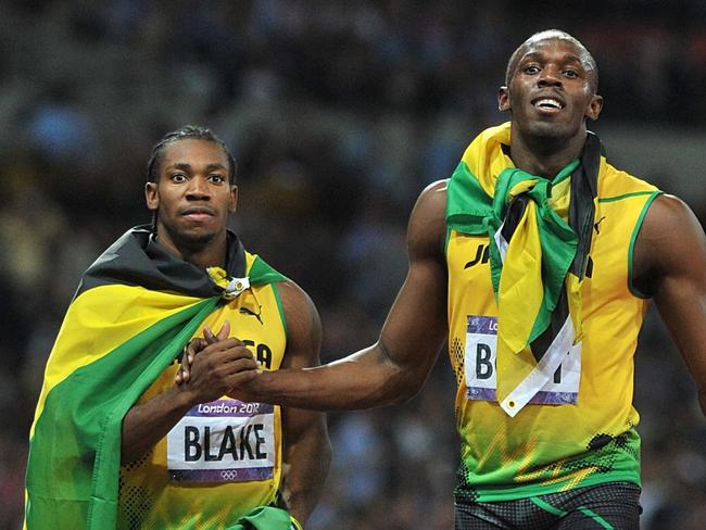 09/08/2012 WIRE: Jamaica's Silver medalist Yohan Blake (left) and Gold medalist Usain Bolt celebrate after the Men's 200m Final. OLY12 Pic. Pa