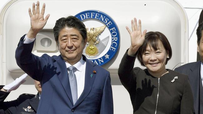 ‘A sea of peace, friendship and co-operation’: Shinzo Abe and his wife Akie depart for Beijing from Tokyo’s Haneda airport yesterday. Picture Getty Images