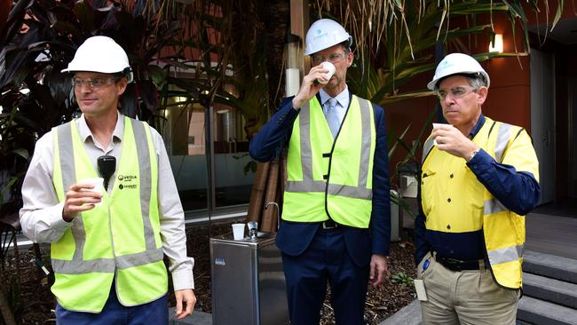 Operations Manager Scott Murphy, Minister for Energy, Biofuels and Water Supply Mark Bailey and Seqwater Acting CEO Jim Pruss sample water treated at the Tugun plant. Photo: Steve Holland