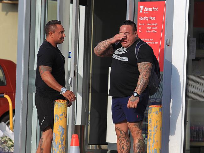 A man fights back tears out the front of Fitness First, Rockdale the scene were Mick Hawi was shot and later died. Picture: Supplied