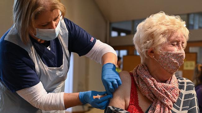 An elderly woman receives the Oxford/AstraZeneca Covid-19 vaccine in Sheffield, England, last week. Picture: AFP