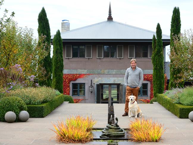 Legendary garden designer Paul Bangay at Stonefields, his beautiful Macedon Rangers property. Pictured with his Labrador doggie Timber.