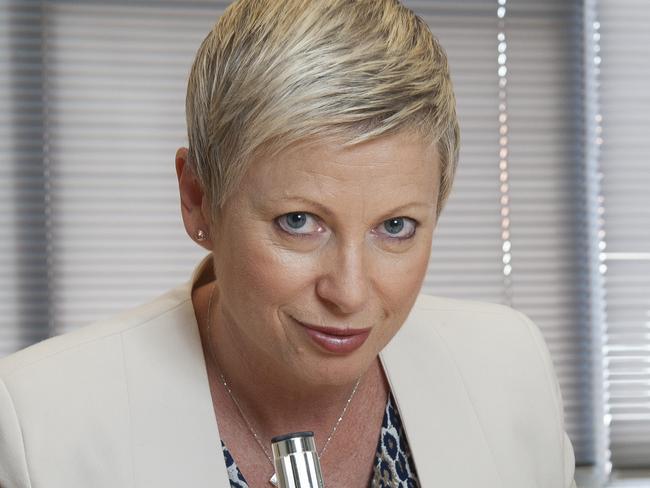 News Corp - Lisa Montgomery (Mortgage and Consumer Finance Expert) is pictured with a mock up bank statement to go with a story about 'What your bank statement says about you'. All photographs taken at Holt Street, Sydney NSW Australia