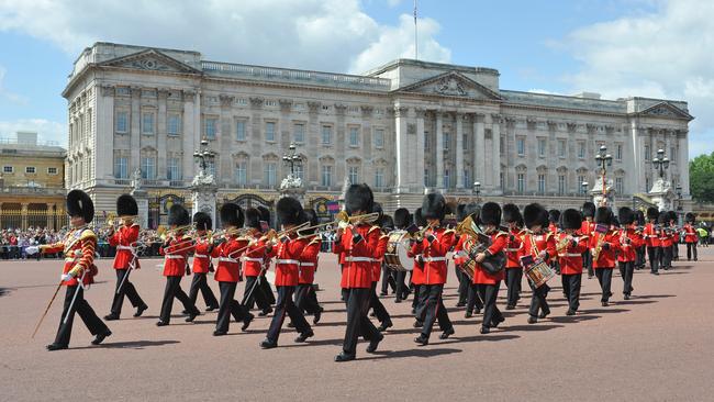 British guards bandsmen parade outside Buckingham Palace as part of the daily changing the guard ceremony.