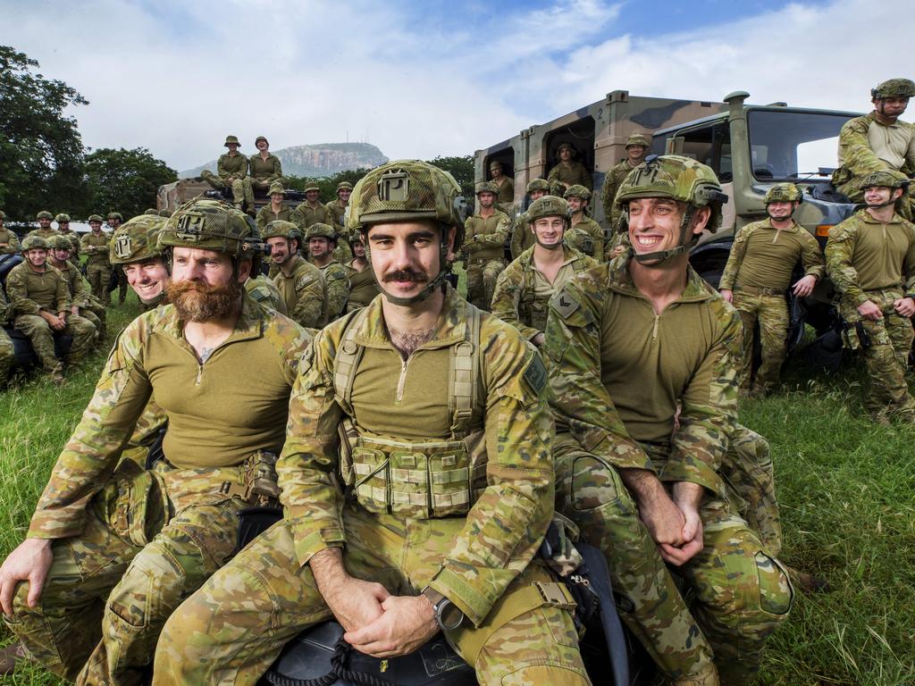 Sgt Andrew Rimmer and Lt. Harrison Potamianakis (front) with fellow soldiers from 2RAR Amphibious, who were involved in the emergency rescues of hundreds of Townsville residents at Idalia. Picture: Lachie Millard