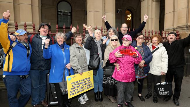 Abuse victims and supporters celebrate the rejection of Pell’s appeal. Picture: Robert Cianflone/Getty Images