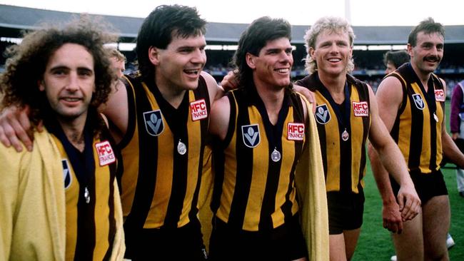 John Platten, Jason Dunstall, Gary Ayres, Dermott Brereton and John Kennedy celebrate winning the 1986 grand final for Hawthorn. Picture: Tony Feder