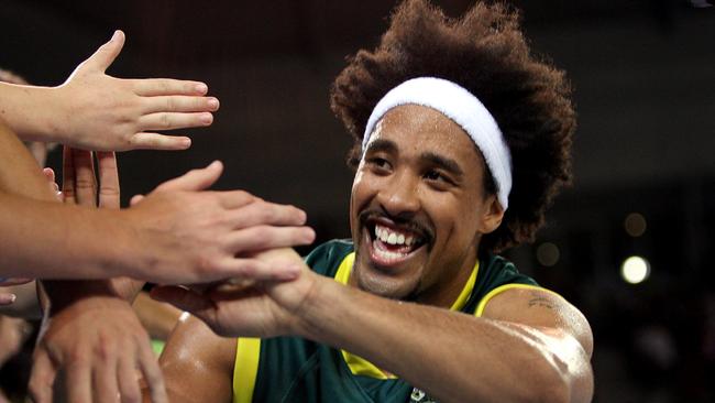 CJ Bruton after Australia’s win in the gold medal match at the 2006 Commonwealth Games in Melbourne.