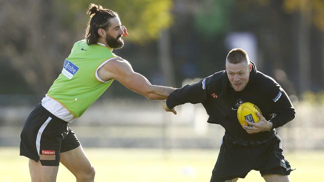 Brodie Grundy tackles Jordan De Goey at training. Picture: Daniel Pockett/Getty Images