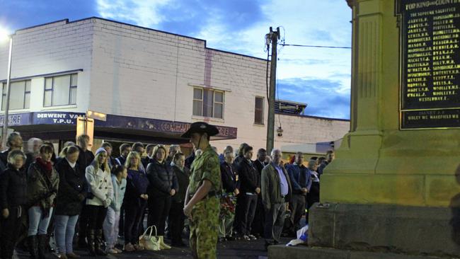 A soldier at the cenotaph at the New Norfolk dawn service. Picture: DAMIAN BESTER