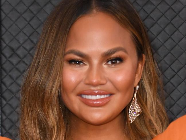 US model Chrissy Teigen arrives for the 62nd Annual Grammy Awards on January 26, 2020, in Los Angeles. (Photo by VALERIE MACON / AFP)