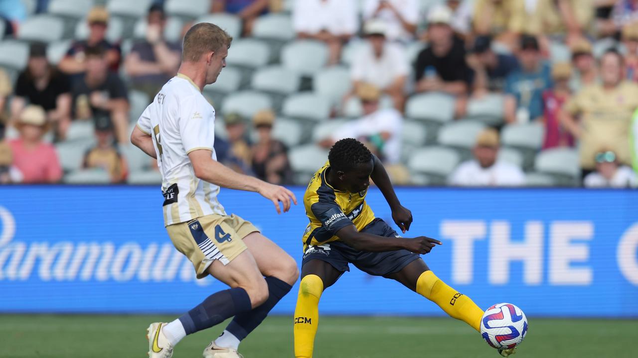 Returning Socceroo Garang Kuol takes a shot for the Mariners in their loss to Newcastle. Picture: Scott Gardiner/Getty Images