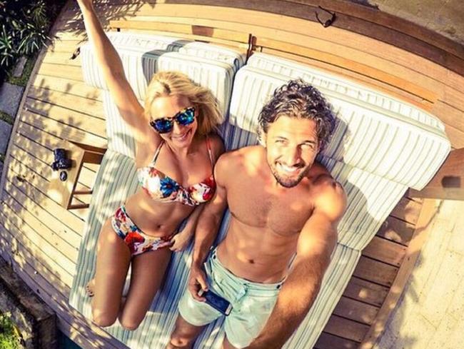 Lazy days ... reality stars Anna Heinrich and Tim Robards relax in Bali. Picture: Instagram