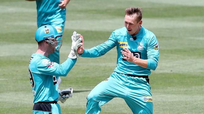 ADELAIDE, AUSTRALIA - JANUARY 26: Marnus Laubuschagne of the Heat celebrates the wicket of Jhye Richardson of the Scorchers with Jimmy Peirson during the Big Bash League match between the Brisbane Heat and Perth Scorchers at Adelaide Oval on January 26, 2021 in Adelaide, Australia. (Photo by Sarah Reed/Getty Images)