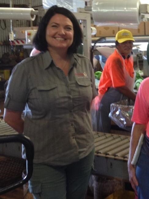 NQ Powertrain CEO Kasey Rudd pictured on site at fruit farm.