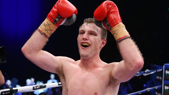 Jeff Horn celebrates winning his Welterweight bout against Randall Bailey.