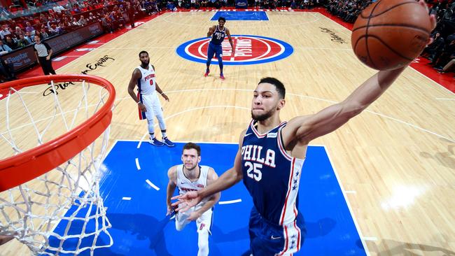 Simmons dunks the ball against the Detroit Pistons. Picture: Brian Sevald/NBAE