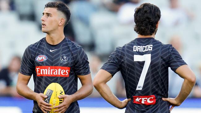 Nick Daicos, left, before Friday night’s win over Geelong. Picture: Michael Willson/AFL Photos