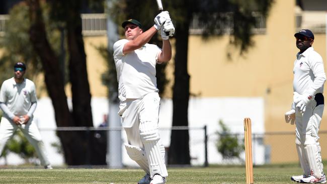 A familiar sight: Trent Lawford launches another six for Yarraville Club on Saturday. Picture: Steve Tanner