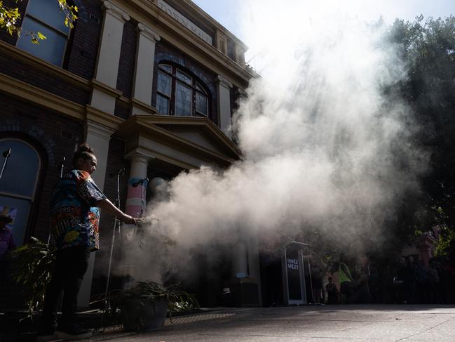 SYDNEY, AUSTRALIA - FEBRUARY 11: A smoking ceremony is performed during the launch of Newtown Pride Square on February 11, 2023 in Sydney, Australia. Sydney is hosting WorldPride from 17 February to 5 March 2023. (Photo by Sean Foster/Getty Images)