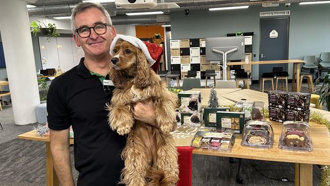 Woolworths CEO Brad Banducci and his pet dog Juno.