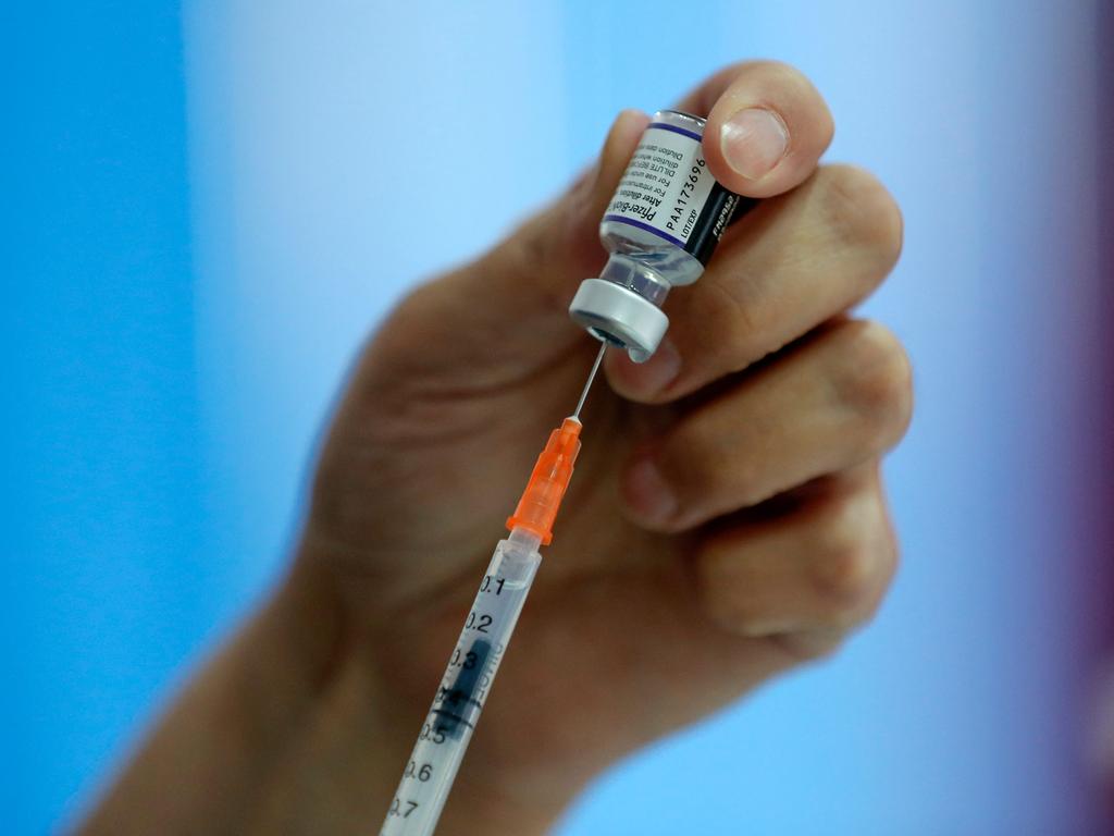 A health worker prepares a dose of the Pfizer vaccine in Santiago. Picture: Javier Torres/AFP