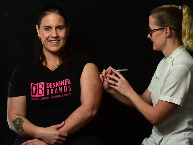Katrina Faint gets an injection from pharmacist Nikki Lade. Picture: Evan Morgan