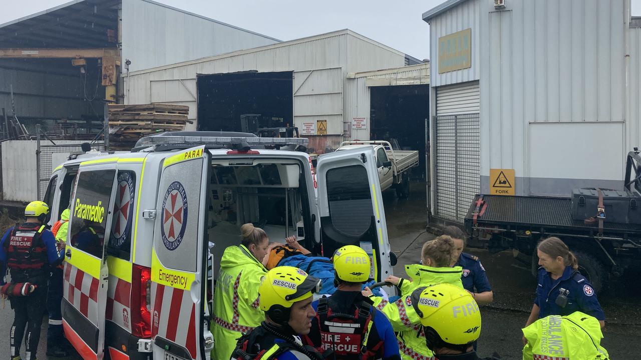 The dramatic rescue of a woman believed to be in her 80s, rescued form flood waters near Kempsey. Picture: Dan Mills