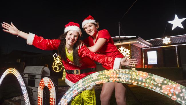 Talia Kirstenfeldt (left) and Mia Curtis at Talia's Kearneys Spring Christmas lights display. Picture: Kevin Farmer