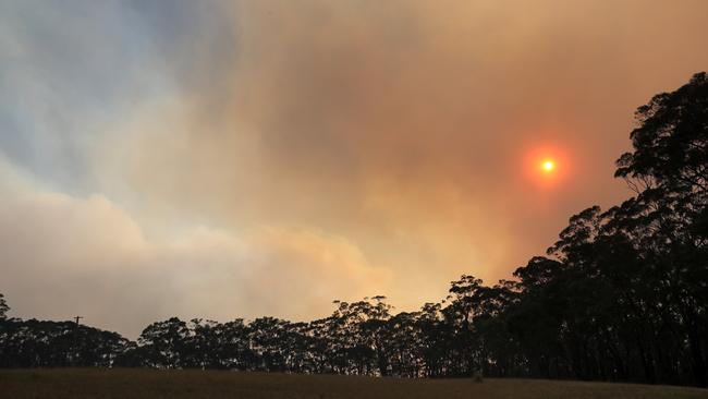 The sky at Nattai is thick with smoke. Picture: Richard Dobson