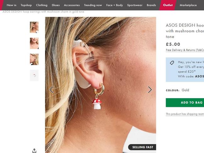 Natasha Ghouri models the earrings on the ASOS website.