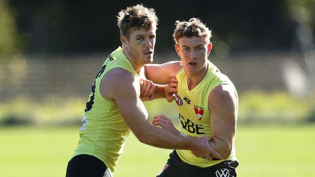 Chad Warner, right, with Luke Parker at Swans training. Picture: Picture. Phil Hillyard