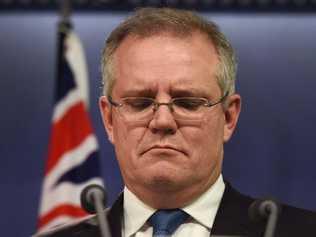 Treasurer Scott Morrison says cuts are necessary for tax relief. . Picture: AFP PHOTO - William West