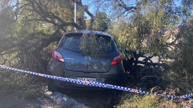 A teenage girl allegedly carjacked a woman at knifepoint, then slamming the stolen getaway car into a power pole at Mermaid Waters. Picture: Jordan Bissell/7News