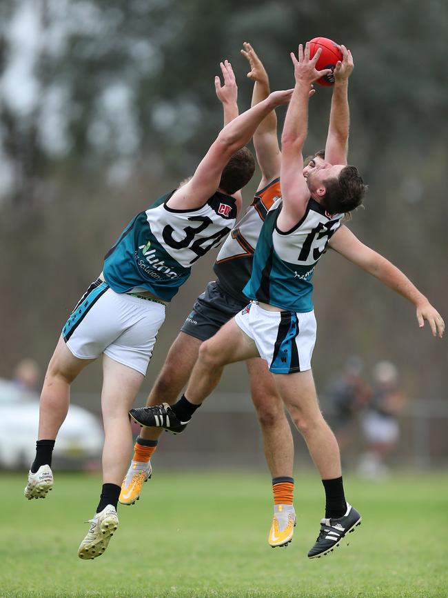 Deaken Clancy, 34, Thomas Moloney, 15, CDHBU Power &amp; Hayden Wardius, 35, RWW Giants. Picture: Yuri Kouzmin