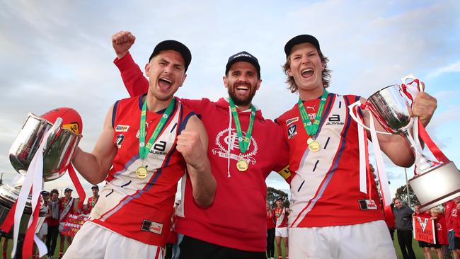 Congupna captain Daniel Schaper, coach Ben Bingham and best-on-ground Sam Buxton.