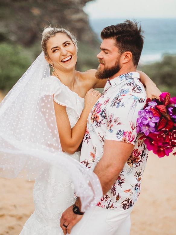 Loch on her wedding day with husband Sam.