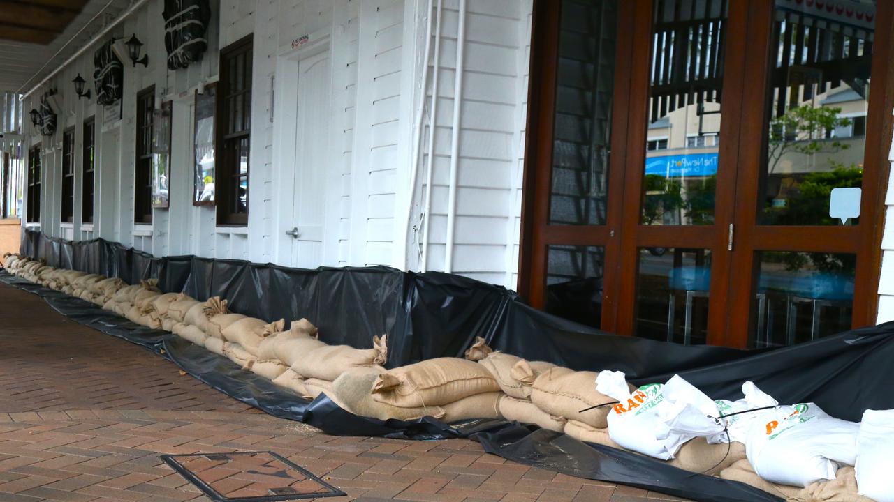 Sandbags on Macrossan St Port Douglas on Tuesday ahead of Jasper’s touchdown. Picture: Peter Carruthers