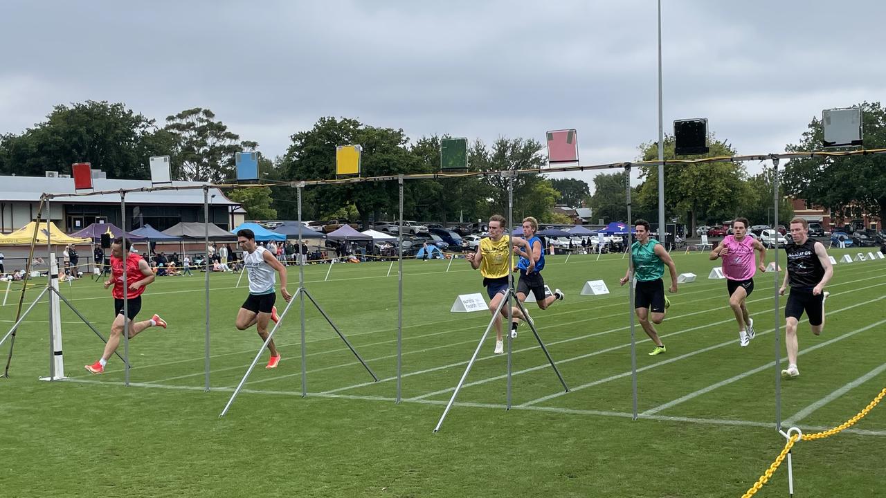 Jack Hale (red) wins his semi-final at the Ballarat Gift. Picture: Shane Jones.