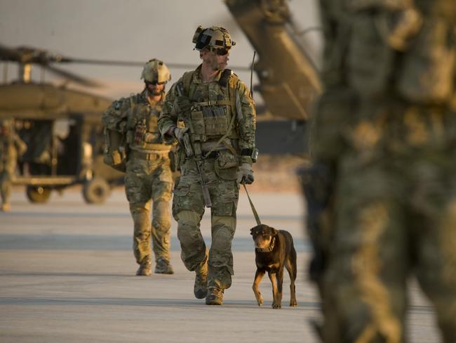 Australian Army soldiers from Special Operations Task Group return to Multi-National Base Tarin Kowt, Uruzgan province, after another successful mission in southern Afghanistan in March 2011. *** Local Caption *** Australian Army soldiers from Special Operations Task Group (SOTG) are deployed to Uruzgan province in southern Afghanistan to conduct population-centric, security and counter-network operations alongside their Afghan National Security Forces partners against Taliban insurgents.   SOTG comprises personnel from the Special Air Service Regiment, 1st and 2nd Commando Regiments, Incident Response Regiment, Special Operations Logistics Squadron and a variety of supporting units from the ADF. Picture: Department of Defence