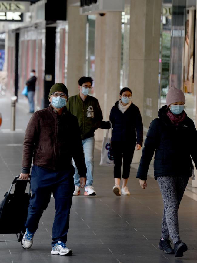 People have started to wear face masks after the recent spike in COVID-19 cases in Melbourne. Picture: Andrew Henshaw