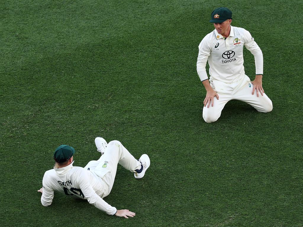 Steve Smith and Nathan McSweeney react after a ball hit by Yashasvi Jaiswal of India went between them during day two. Picture: Cameron Spencer/Getty Images