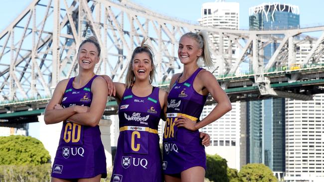Queensland Firebirds players Kim Jenner, Lara Dunkley and Rudi Ellis will help get the new Super Netball season underway. Picture: Tara Croser